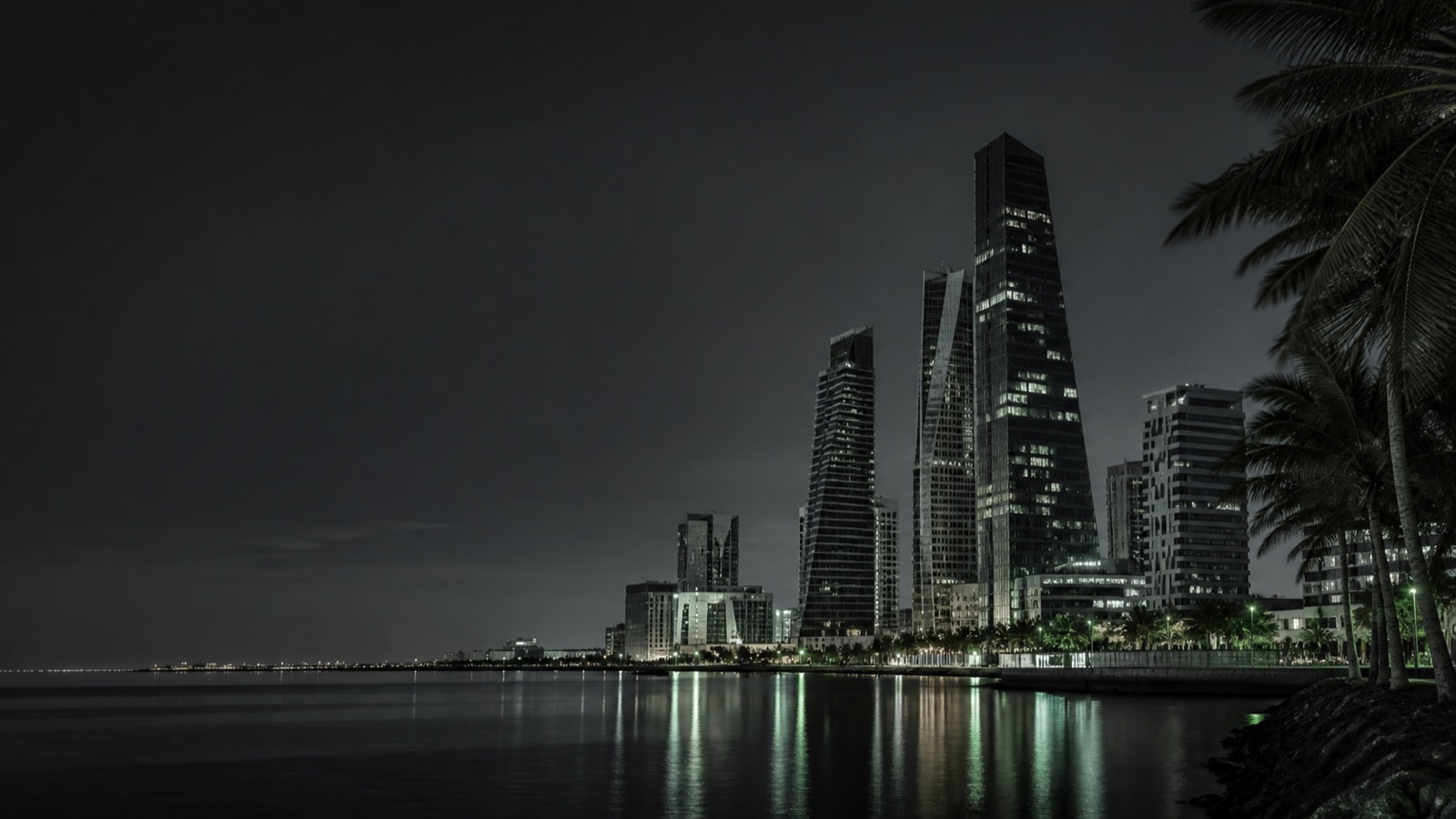 Jeddah skyline at night with subtle green reflections